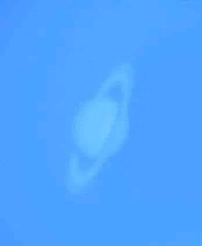 A planet in the sky

Description automatically generated